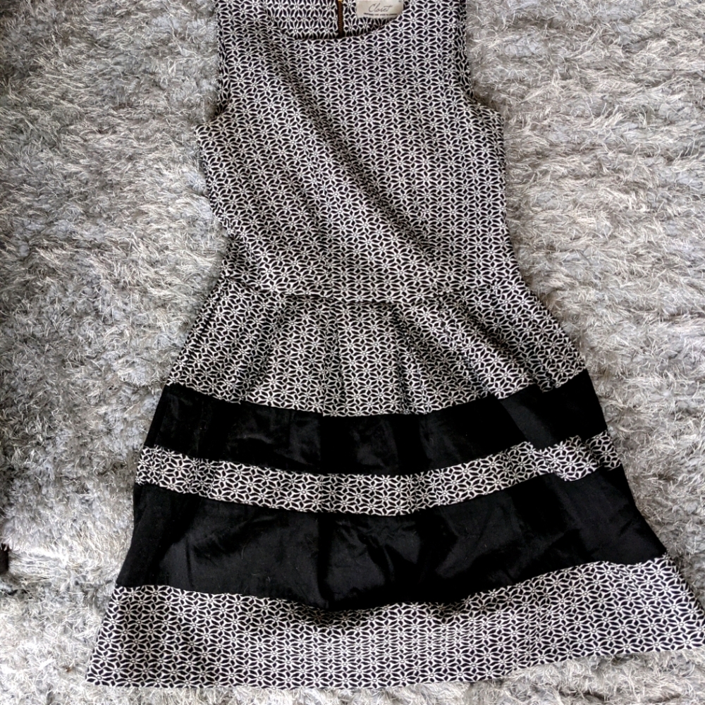 Dress with flared "skirt"